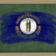 Chalky american state of kentucky flag painted with color chalk on old blackboard