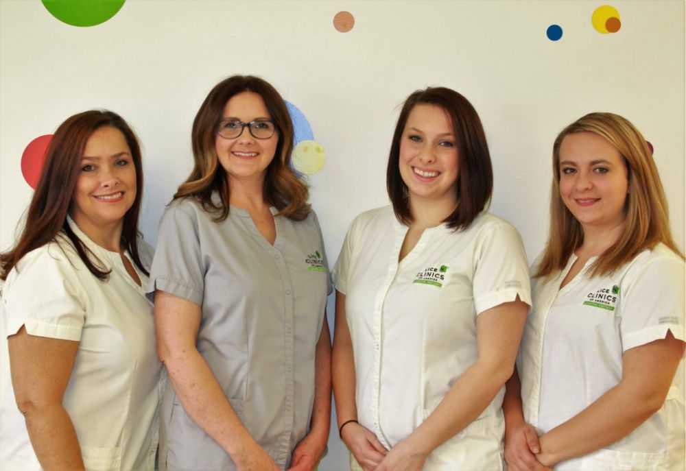 All four smiling clinicians at lexington lice clinic