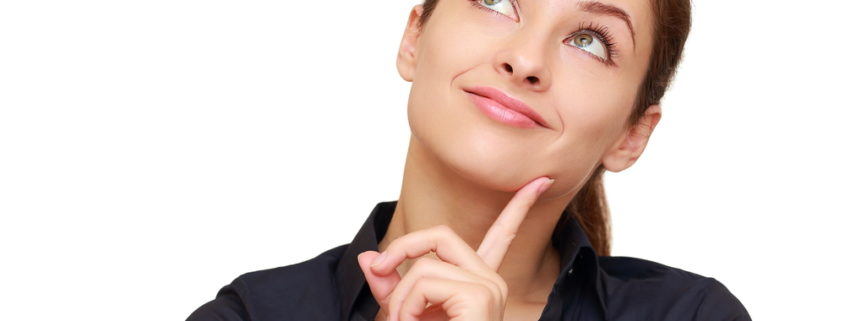Thinking business woman looking up isolated on white background