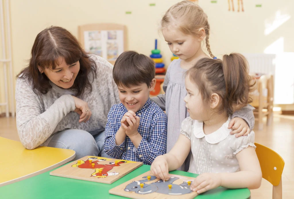 teacher-with-students-1024x694-1